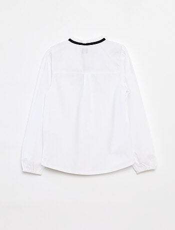 Chemisier avec volants et nœud fantaisie au col
