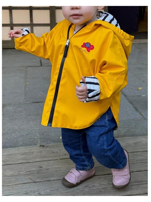 Ciré imperméable bébé avec Capuche 'Breizh Ocean', Poncho Intérieur rayé avec Broderie - Kiabi Ciré imperméable bébé avec Capuche 'Breizh Ocean', Poncho Intérieur rayé avec Broderie - Kiabi
