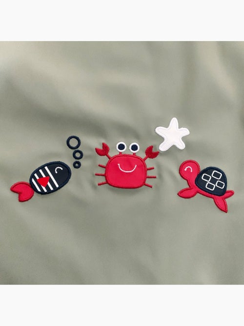 Ciré imperméable bébé avec Capuche 'Breizh Ocean', Poncho Intérieur rayé avec Broderie - Kiabi