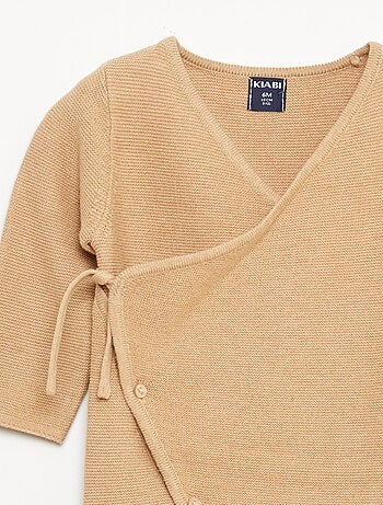 Combinaison en tricot avec ouverture cache-cœur