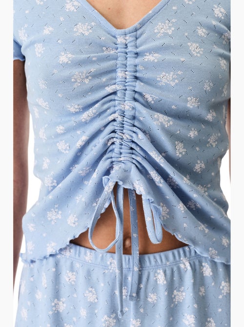 Coralie pointel crunchy pyjamaset met bloemenprint, korte mouwen en short penti - Kiabi Coralie pointel crunchy pyjamaset met bloemenprint, korte mouwen en short penti - Kiabi