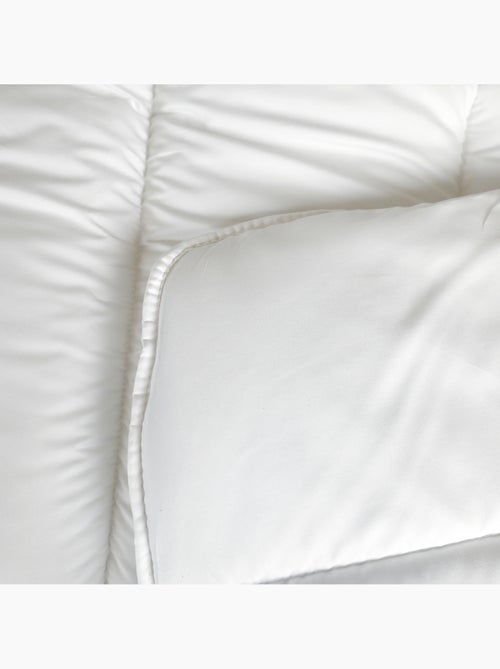 Couette chaude respirante premium 533 g/m² traitement anti acarien - Kiabi Couette chaude respirante premium 533 g/m² traitement anti acarien - Kiabi