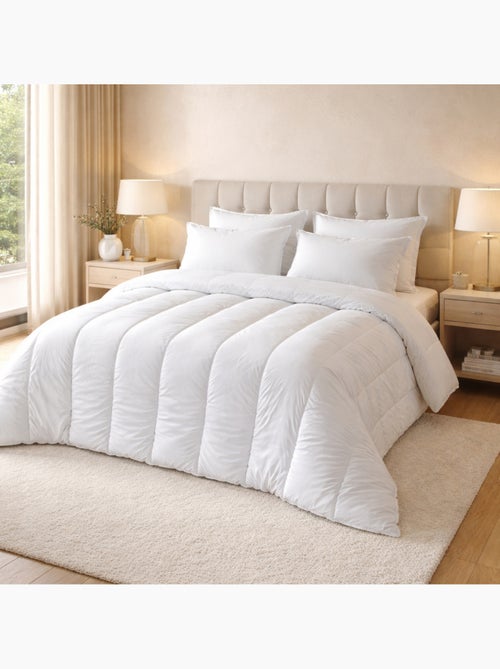 Couette chaude respirante premium 533 g/m² traitement anti acarien - Kiabi Couette chaude respirante premium 533 g/m² traitement anti acarien - Kiabi
