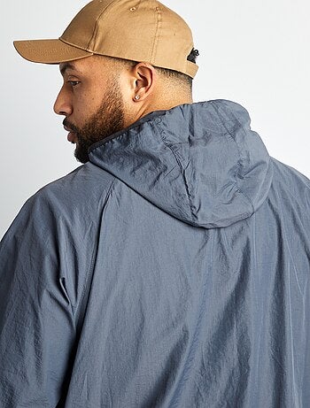 Coupe vent uni pliable dans la capuche