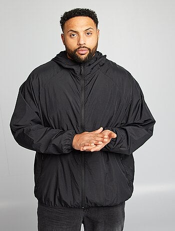 Coupe vent uni pliable dans la capuche