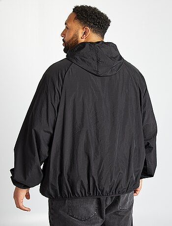 Coupe vent uni pliable dans la capuche