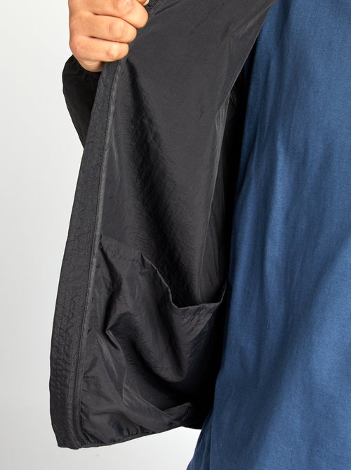 Coupe vent uni pliable dans la capuche - Kiabi