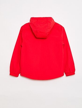 Coupe-vent uni pliable dans sa capuche