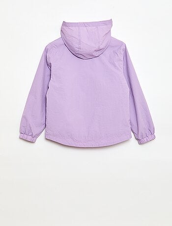 Coupe-vent uni pliable dans sa capuche