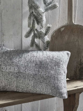 Coussin brodé déhoussable