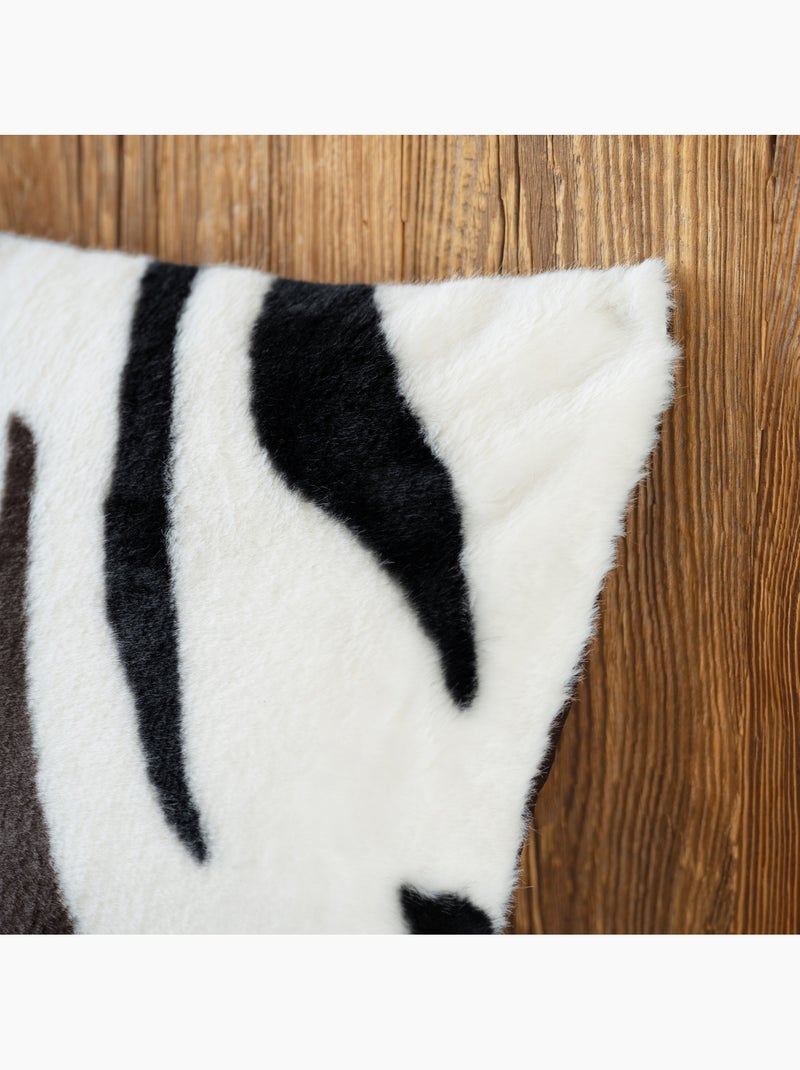 Coussin garni à motif zèbre avec dos en velours Noir - Kiabi