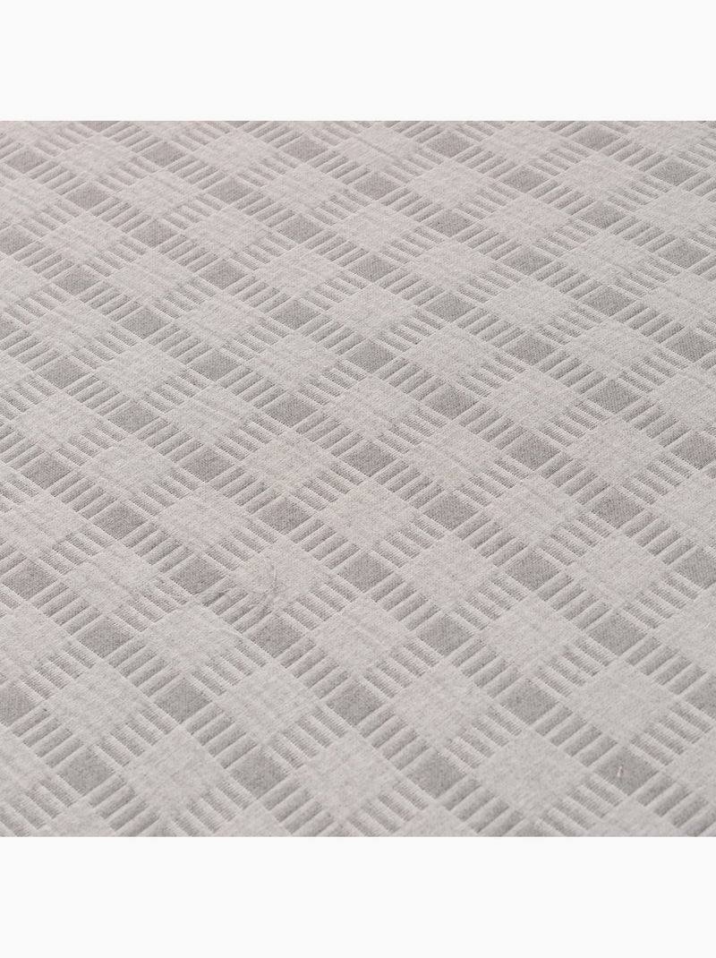 Couvre-lit en coton avec motif à carreaux en relief, tissu texturé. Gris - Kiabi