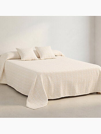 Couvre-lit en coton avec motif floral en relief, tissu texturé.