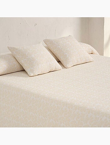 Couvre-lit en coton avec motif floral en relief, tissu texturé.
