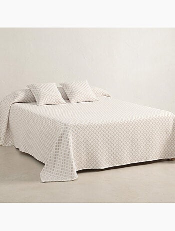 Couvre-lit en coton avec motif géométrique en relief, tissu texturé.