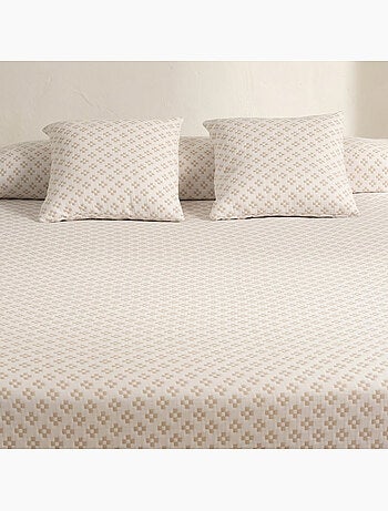 Couvre-lit en coton avec motif géométrique en relief, tissu texturé.