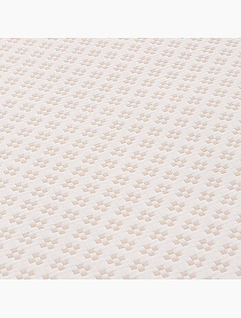 Couvre-lit en coton avec motif géométrique en relief, tissu texturé.