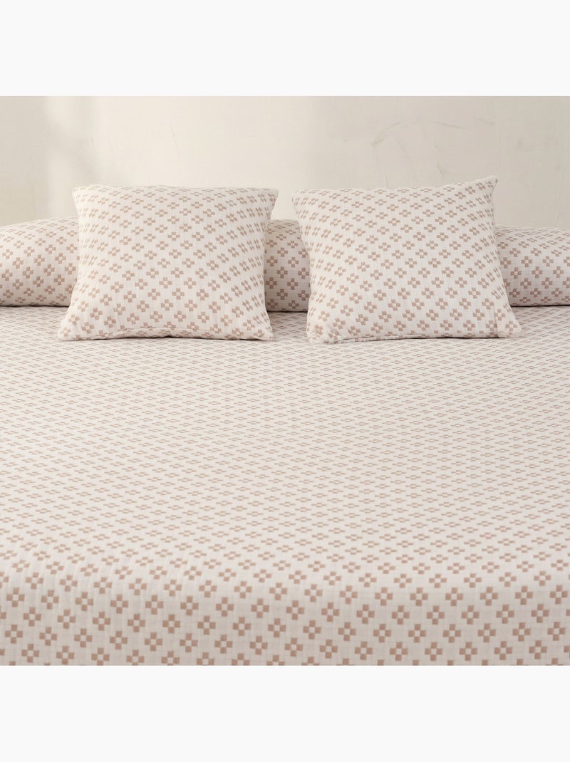 Couvre-lit en coton avec motif géométrique en relief, tissu texturé. Rose - Kiabi