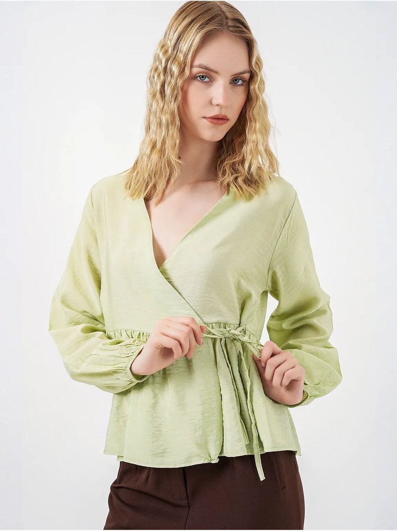 Crêpe wikkelblouse met v-hals en strikdetail bdart Groen - Kiabi