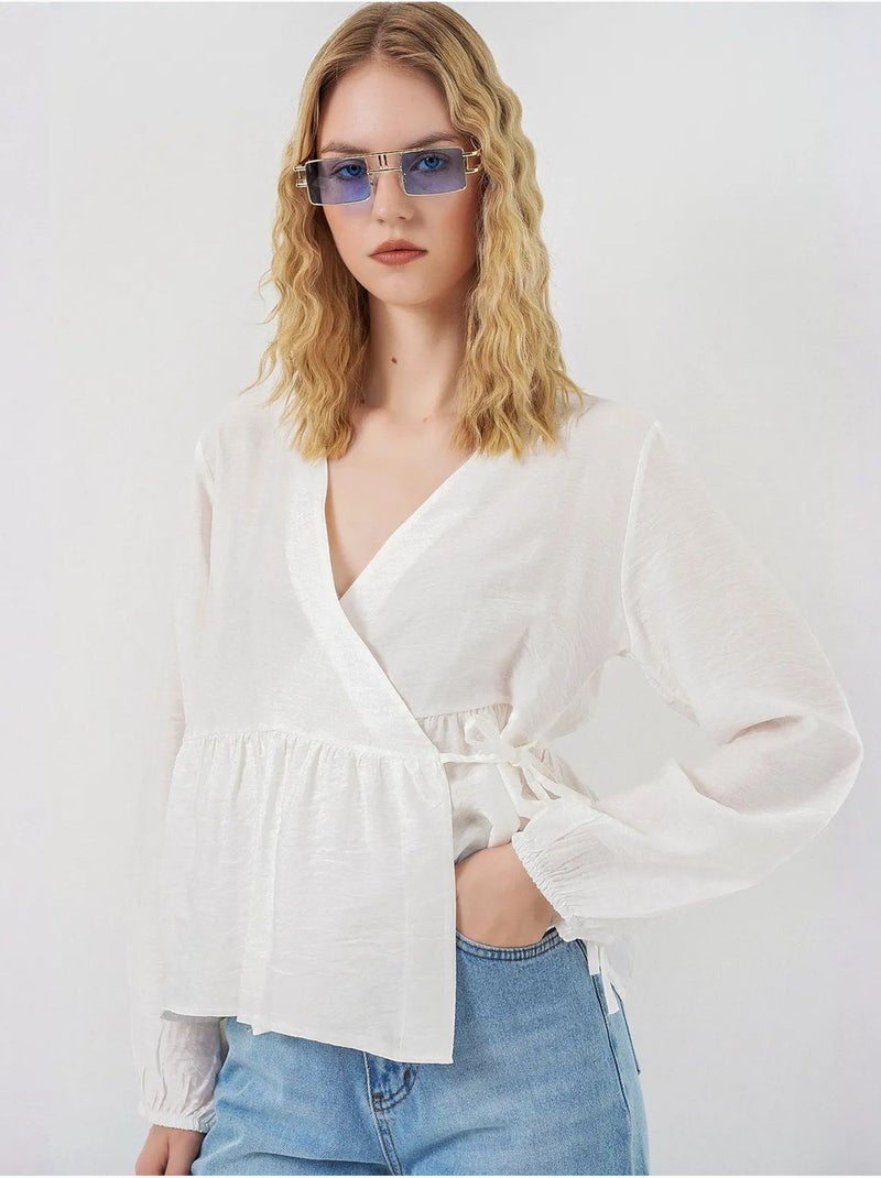 Crêpe wikkelblouse met v-hals en strikdetail bdart Wit - Kiabi