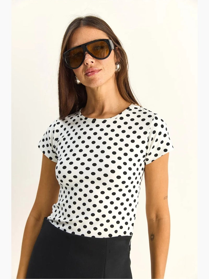 Crop-t-shirt met polkadots en ronde hals lucci Wit Zwart - Kiabi