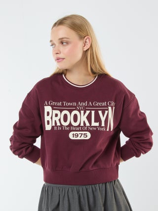 Cropped sweater met opschrift in Amerikaanse stijl