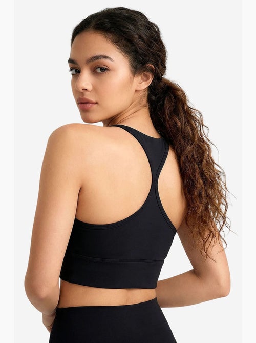 Dames aansluitend crop active top tommy - Kiabi