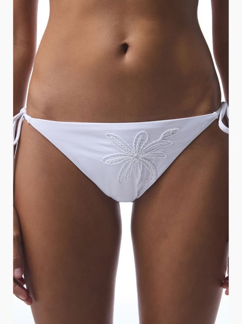 Dames bikinibroekje met borduursel penti - Kiabi Dames bikinibroekje met borduursel penti - Kiabi
