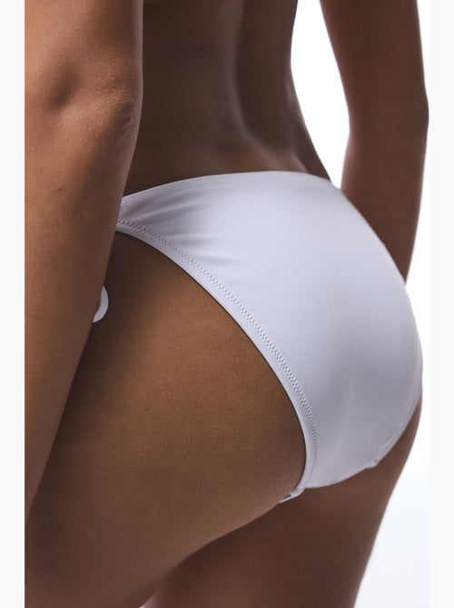 Dames bikinibroekje met borduursel penti - Kiabi Dames bikinibroekje met borduursel penti - Kiabi
