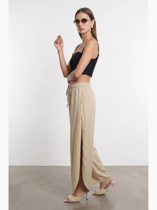 Dames broek van tencel crêpe met wijde pijp en split dilvin - Kiabi