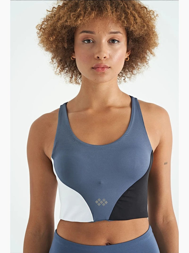 Dames cropped sporttop met kleurvlakken tommy Blauw Wit Zwart - Kiabi