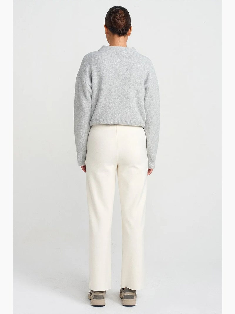 Dames gebreide broek met hoge taille en wijde pijp dilvin Gebroken wit - Kiabi