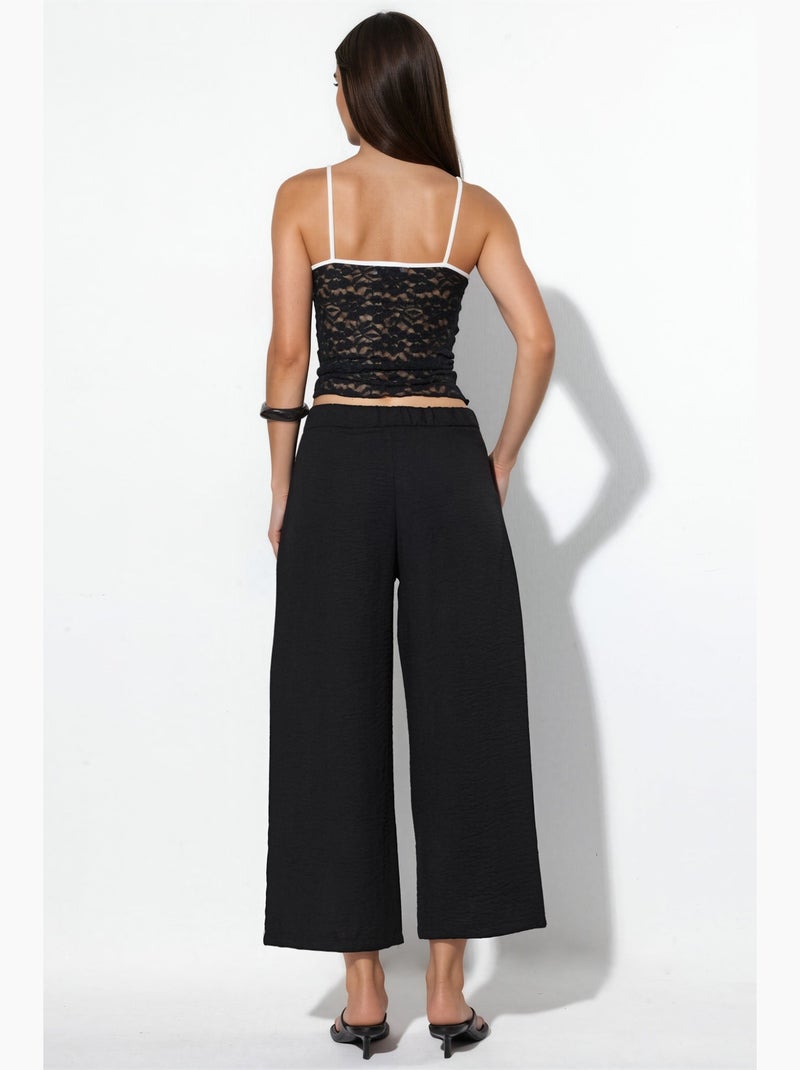 Dames high-waist broek met wijde pijpen busem Zwart - Kiabi