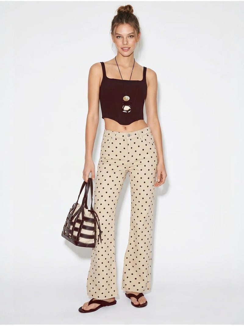 Dames jeans met middelhoge taille en stippen lucci Klei-beige - Kiabi