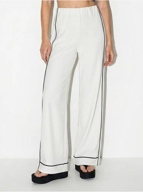 Dames jersey broek met hoge taille en wijde pijp lucci - Kiabi Dames jersey broek met hoge taille en wijde pijp lucci - Kiabi