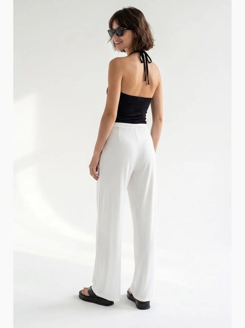 Dames jersey broek met wijde pijp en hoge taille mixray - Kiabi Dames jersey broek met wijde pijp en hoge taille mixray - Kiabi