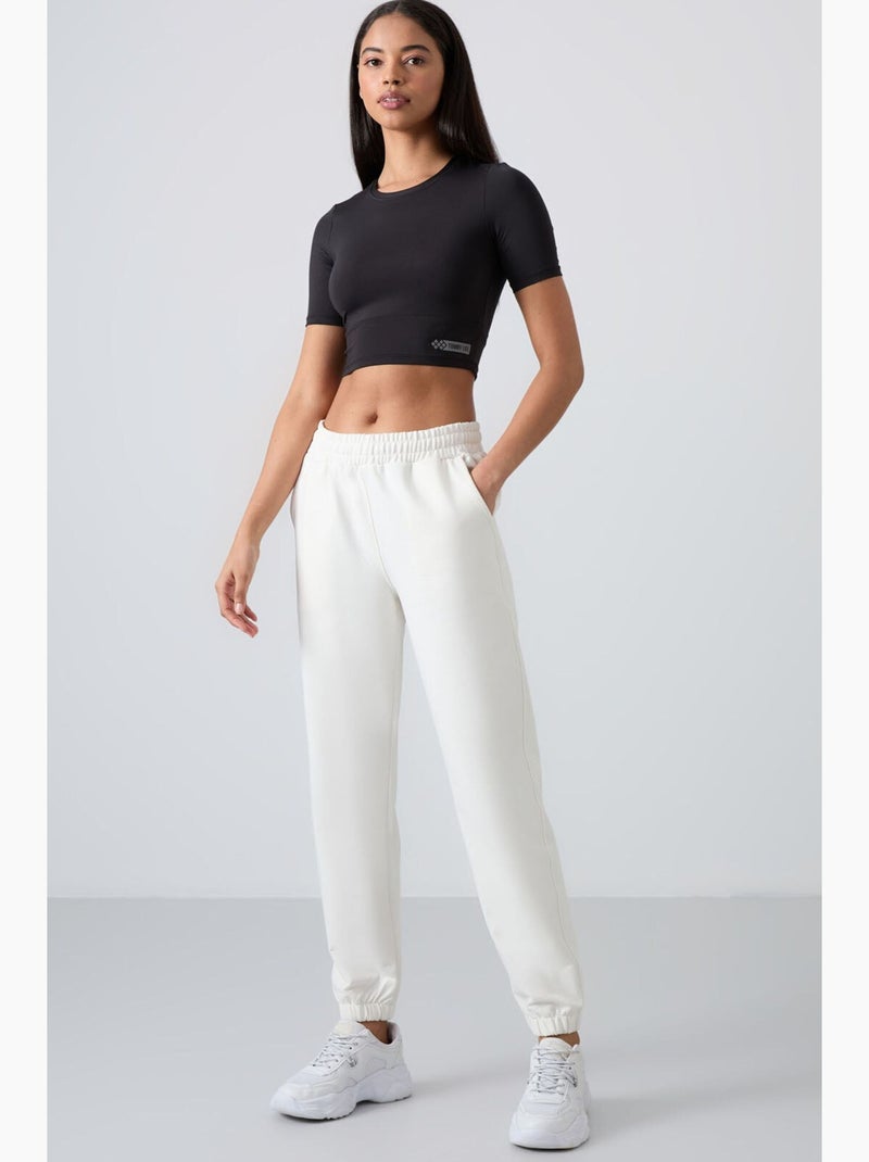 Dames jogger met hoge taille en relaxed fit tommy Wit - Kiabi