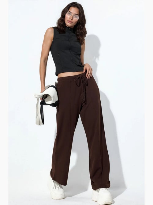 Dames jogger van jersey met uitlopende pijp busem - Kiabi Dames jogger van jersey met uitlopende pijp busem - Kiabi