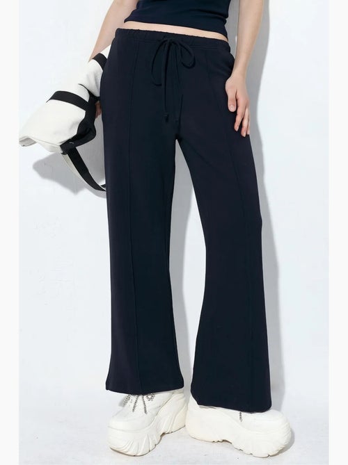 Dames jogger van jersey met uitlopende pijp busem - Kiabi Dames jogger van jersey met uitlopende pijp busem - Kiabi