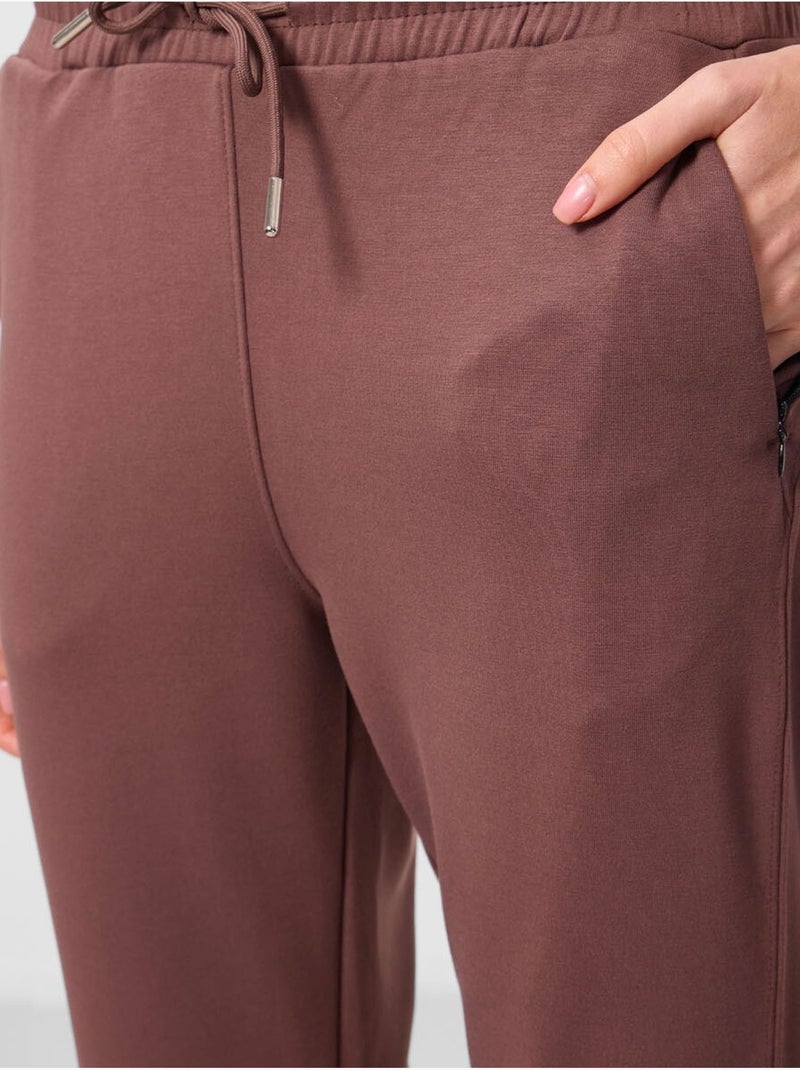 Dames joggingbroek met rits tommy Bruin - Kiabi
