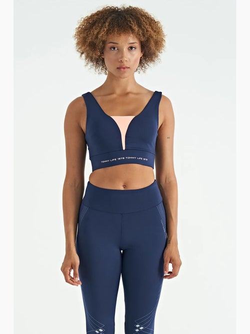 Dames sporttop met kleurvlakken en cropped model tommy - Kiabi