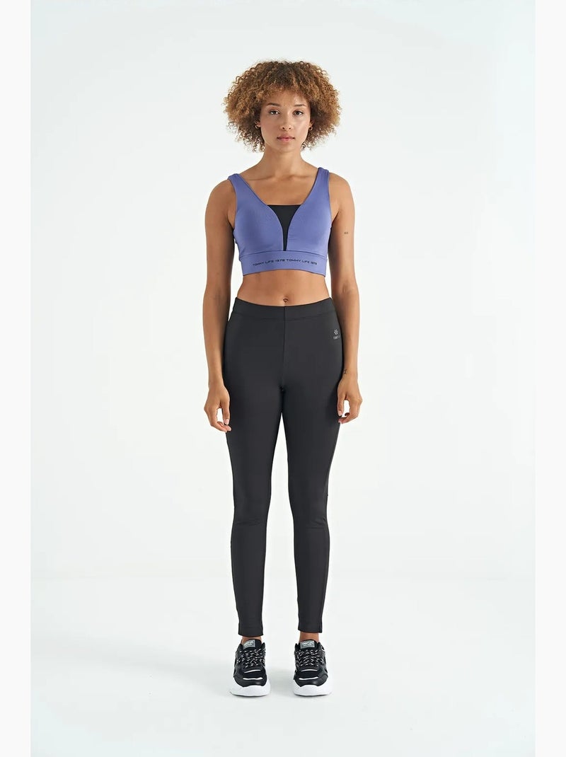 Dames sporttop met kleurvlakken en cropped model tommy Blauw Zwart - Kiabi