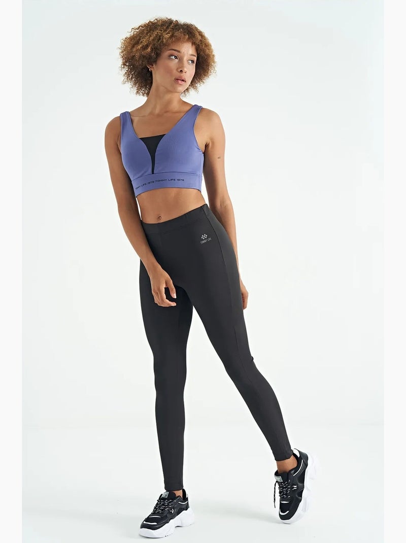 Dames sporttop met kleurvlakken en cropped model tommy Blauw Zwart - Kiabi