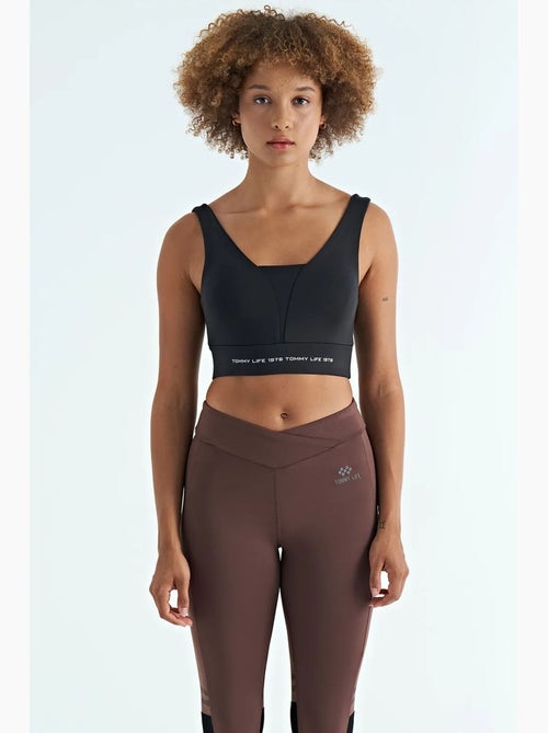 Dames sporttop met kleurvlakken en cropped model tommy - Kiabi