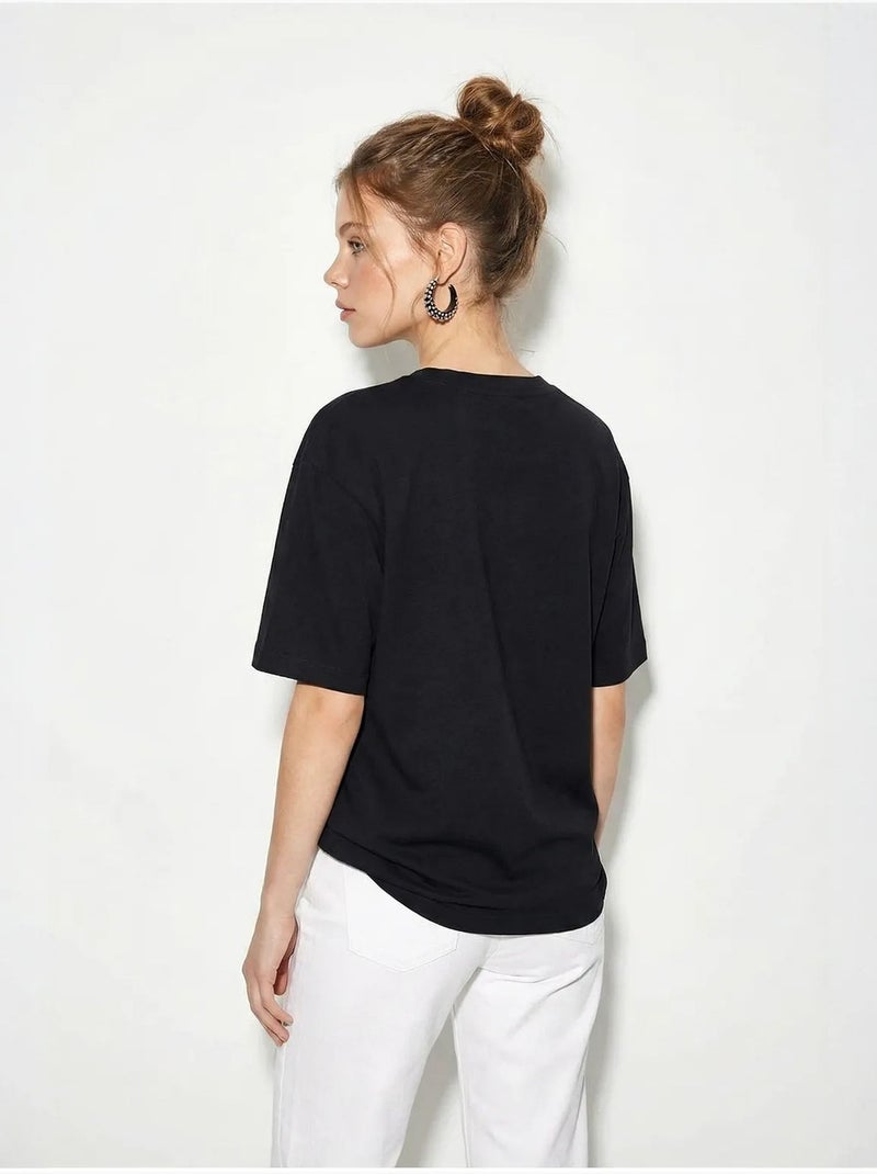 Dames t-shirt van katoen met boothals en print lucci Zwart - Kiabi