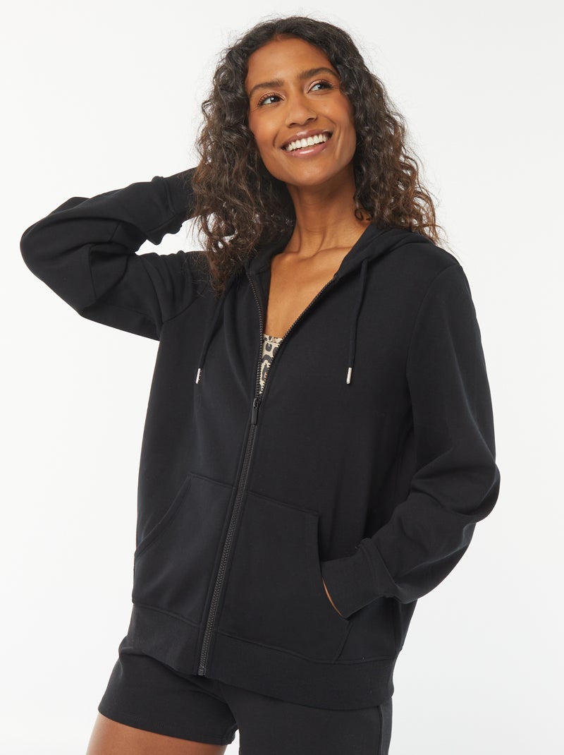 Damesvest van sweatstof met rits en capuchon zwart - Kiabi