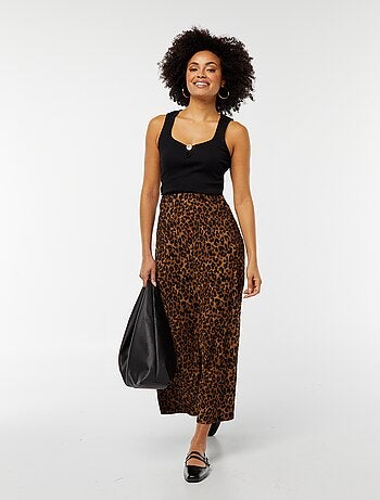 Débardeur sans manches avec encolure dégagée et bouton doré fantaisie