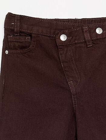 Denim broek met asymmetrische knoopsluiting