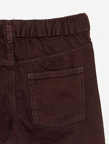 Denim broek met asymmetrische knoopsluiting