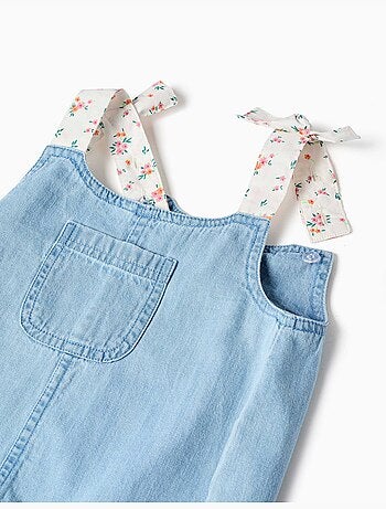 Denim jumpsuit met bloemenbandjes